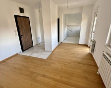 Iznajmljuje se nenamješten stan u zgradi nove gradnje